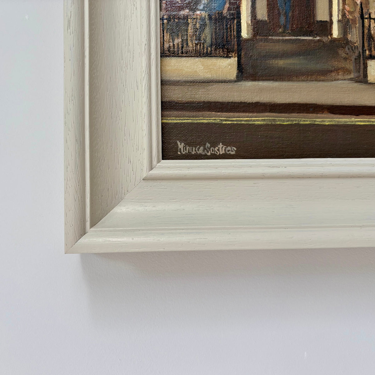Close-up of the white wooden frame and artist's signature on The Albion original oil painting.