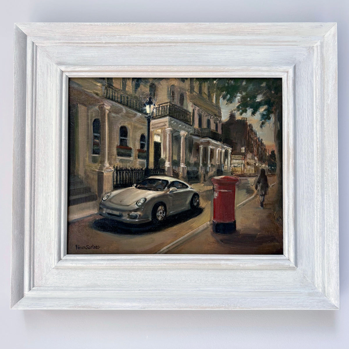 Original oil painting of a quiet street in South Kensington, London, by Minuca Sostres, featuring Victorian townhouses, a silver Porsche and an iconic red postbox at golden hour.