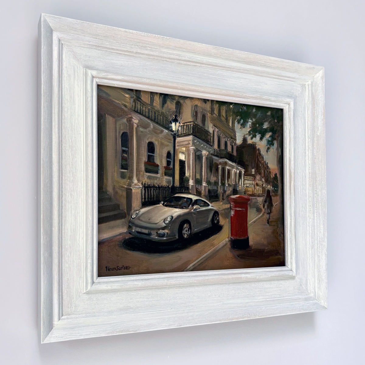 Original oil painting of a quiet street in South Kensington, London, by Minuca Sostres, featuring Victorian townhouses, a silver Porsche and an iconic red postbox at golden hour.