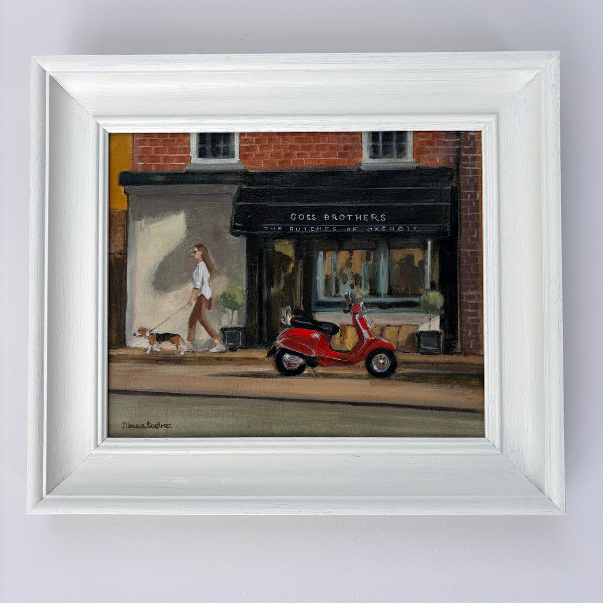 Original oil painting of a red Vespa outside Goss Brothers butcher's shop in Oxshott, Surrey, by Minuca Sostres, capturing the charm of everyday English village life.
